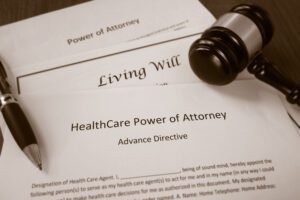 Healthcare Power of Attorney, Living Will documents with legal gavel